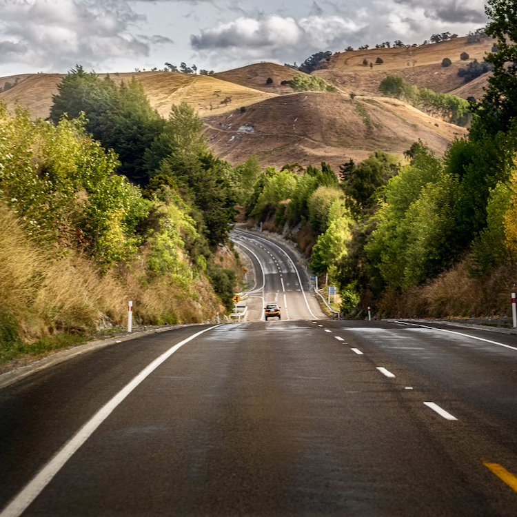 Driving onto the berm or even into the ditch could save your life. 