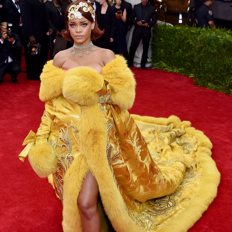 Rihanna wears the Yellow Queen dress created by Guo Pei. 