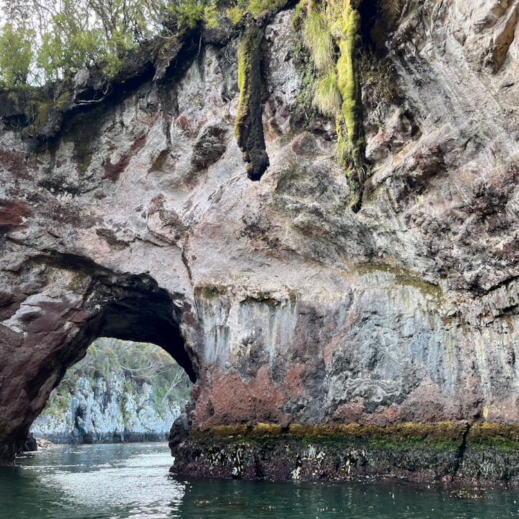Cruising through coastal sea arches and caves. 