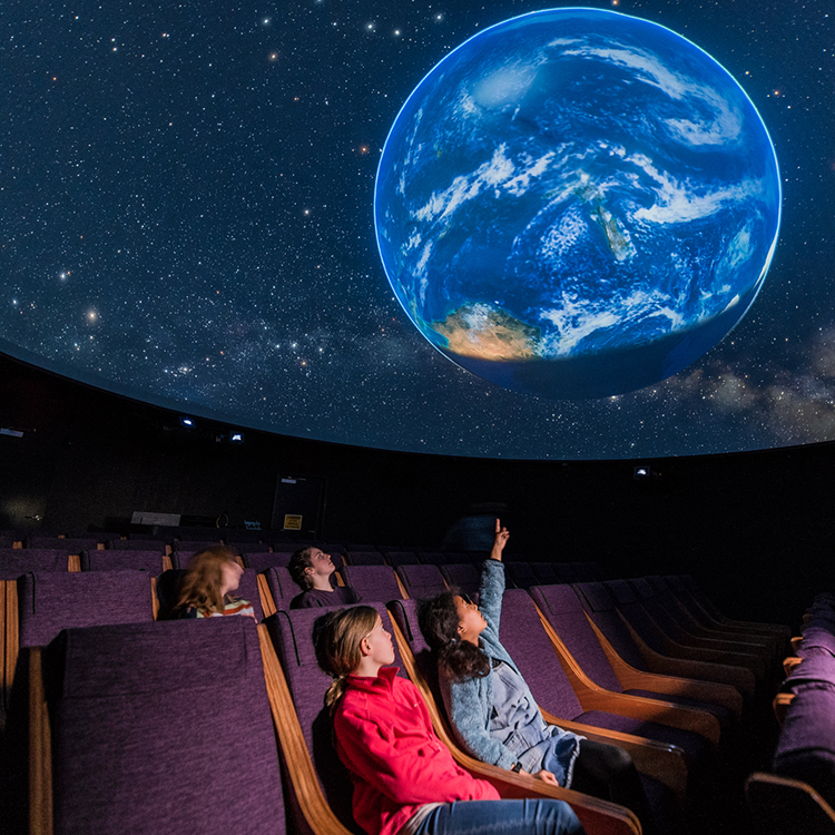 Catch a show at the planetarium at Space Place.