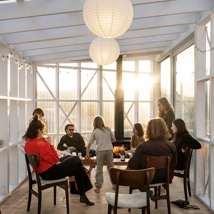 The communal living area includes a fireplace and decking that faces views and sun.t.